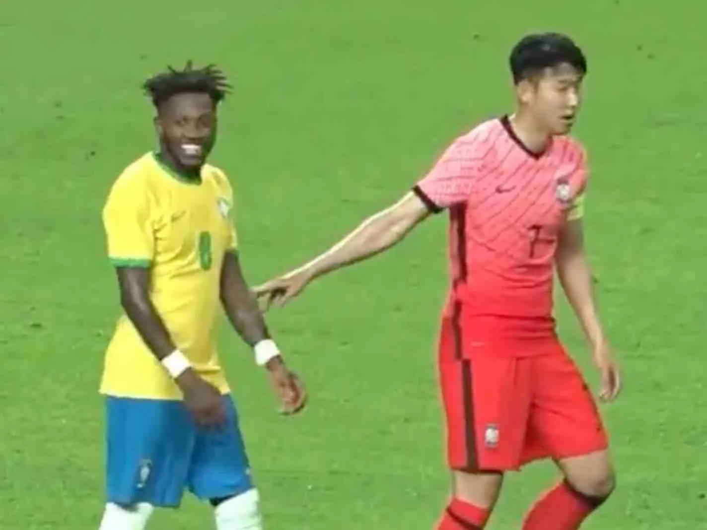Fred and Son Heung-min share a light-hearted moment during South Korea v Brazil friendly at Seoul.