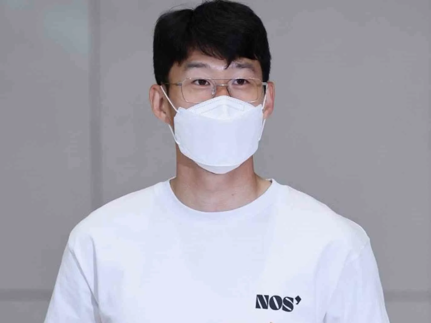 Son Heung-min wearing a NOS7 t-shirt.