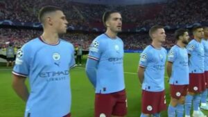 Man CIty line up with maroon shorts for Sevilla game