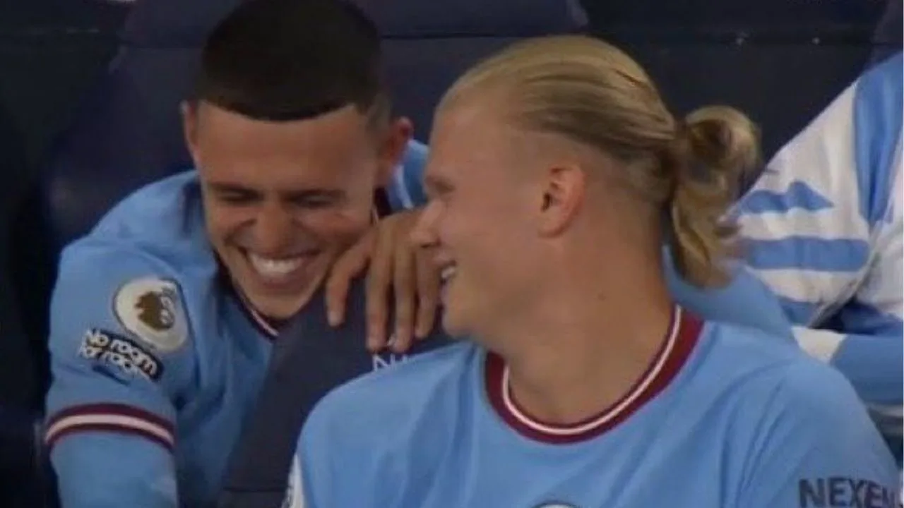 Phil Foden and Erling Haaland all smiles in Man City dugout