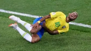 Neymar wincing in pain