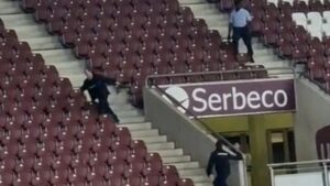 Swiss Football Fan Gets Away From Security Staff In Pac-Man Fashion