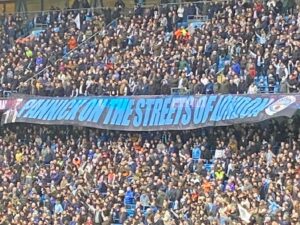 PANNICK ON THE STREETS OF LONDON banner from Man City fans