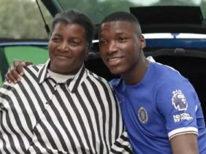 Moises Caicedo with his mother