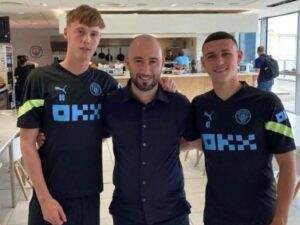 Joe Shields with Cole Palmer and Phil FOden