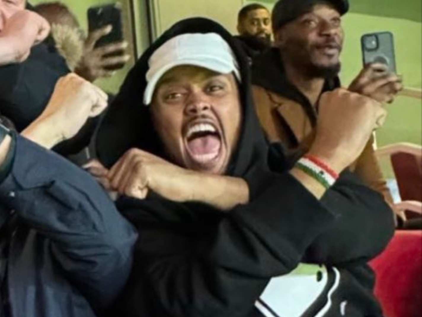 Look: Arsenal Superfan Chunkz Ruffles Feathers By Doing Hammers Sign