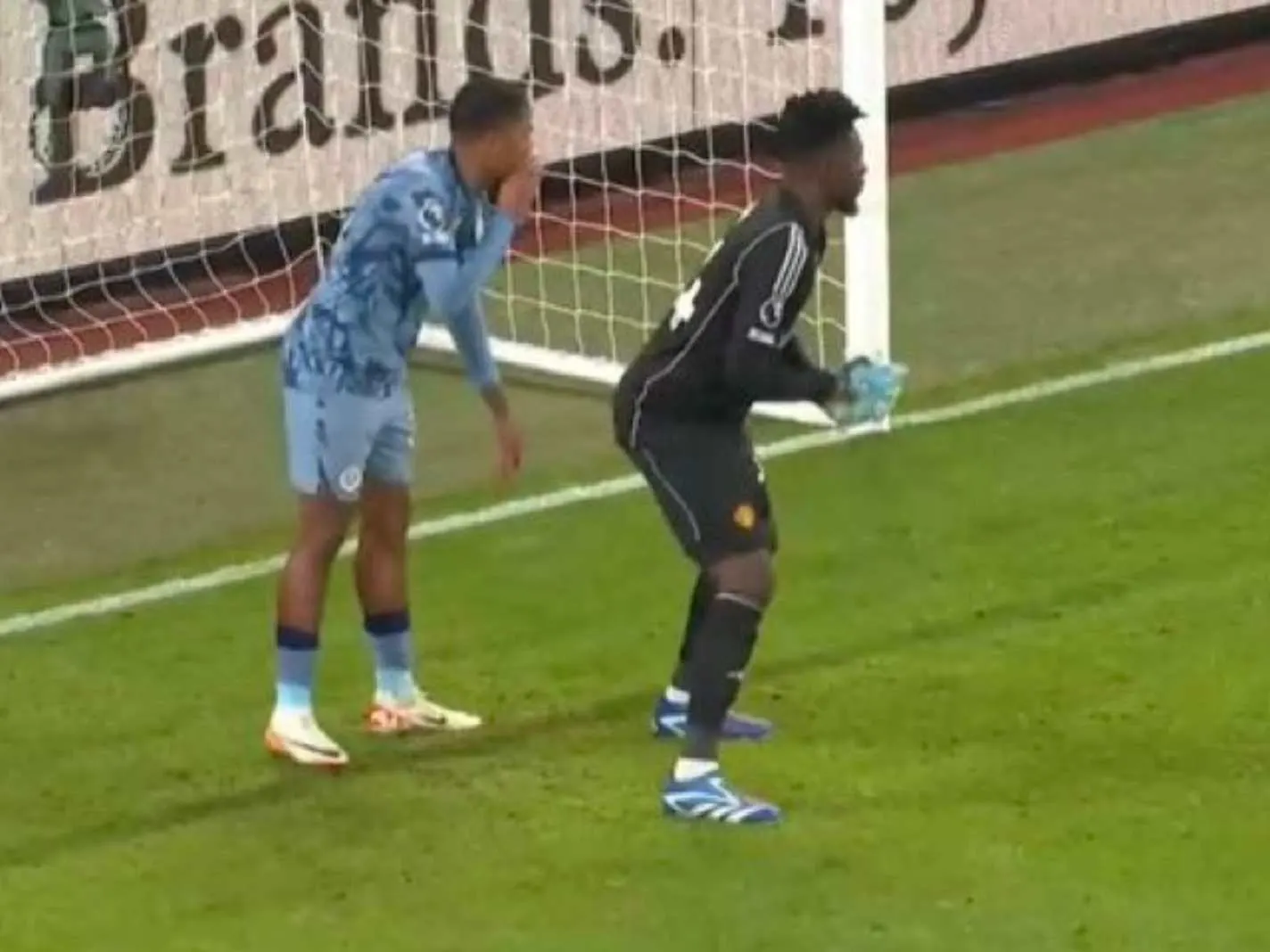 Leon Bailey Standing Behind Andre Onana