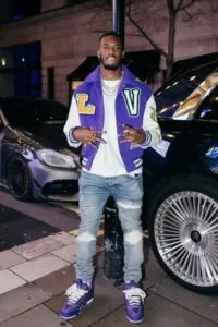 Callum Hudson Odoi goes for a night out in Louis Vuitton varsity jacket and sneakers combo