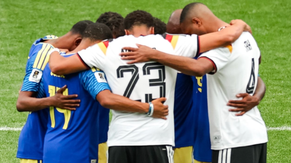 Germany and Curacao players embrace after their World Cup opener (Image via X.com/@TheBlueWaveFFK)